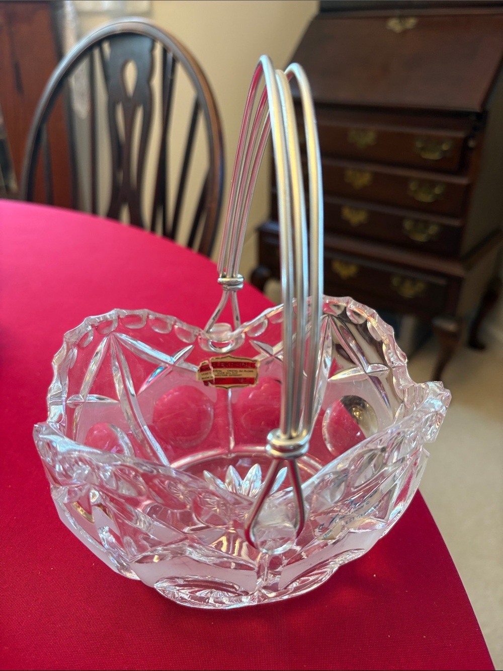 Vintage crystal cut glass basket with metal handle.